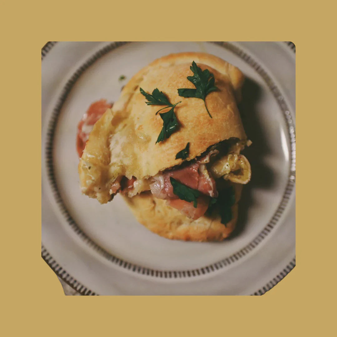 Pesto-Stuffed Calzones with Mozzarella, Salami, and Prosciutto